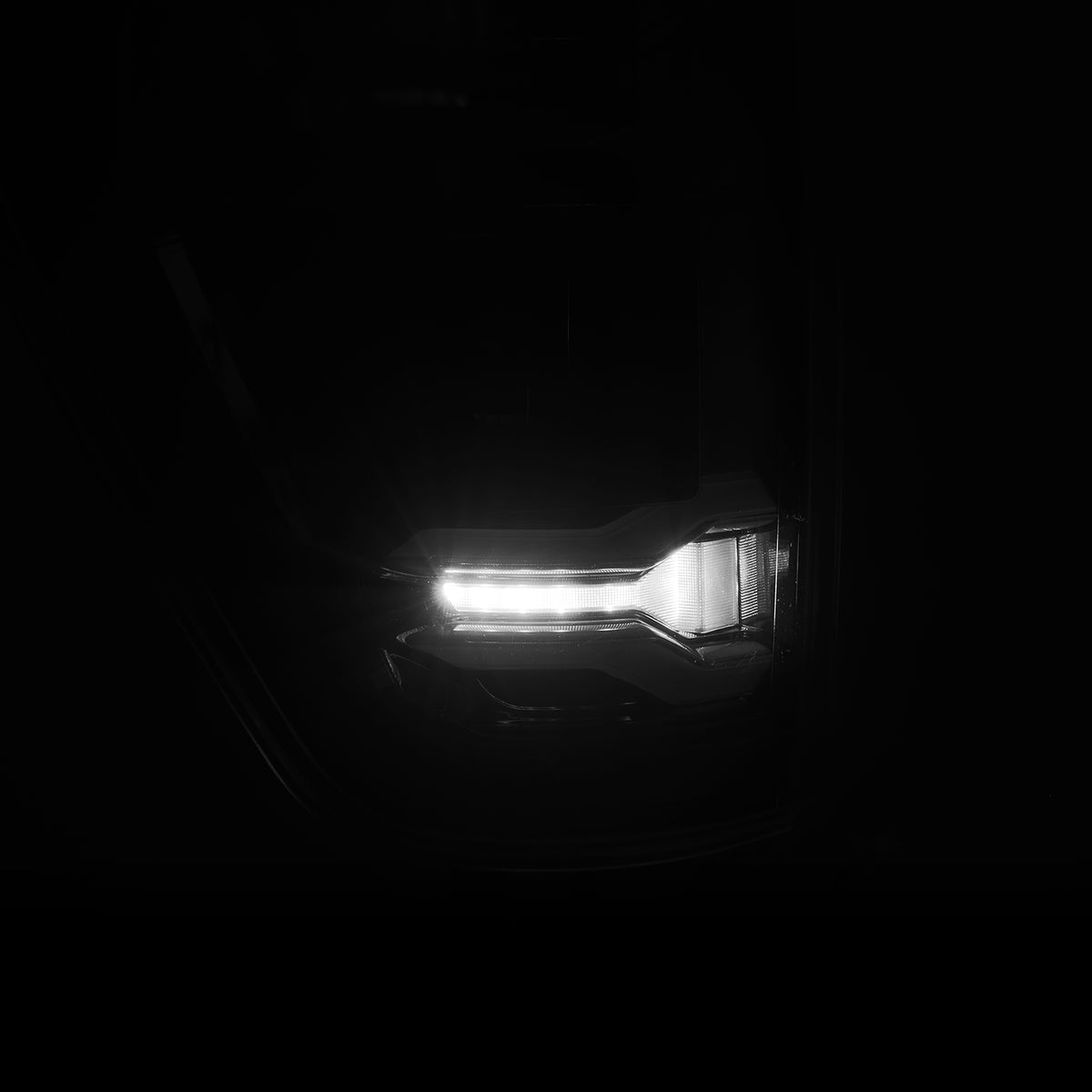 AlphaRex LUXX-Series Sequential LED Tail Lights for 2021-2023 Ford F-150 with Blind Spot Sensor (BLIS), Black Smoke – AlphaRex 653040, photo 6 of 7